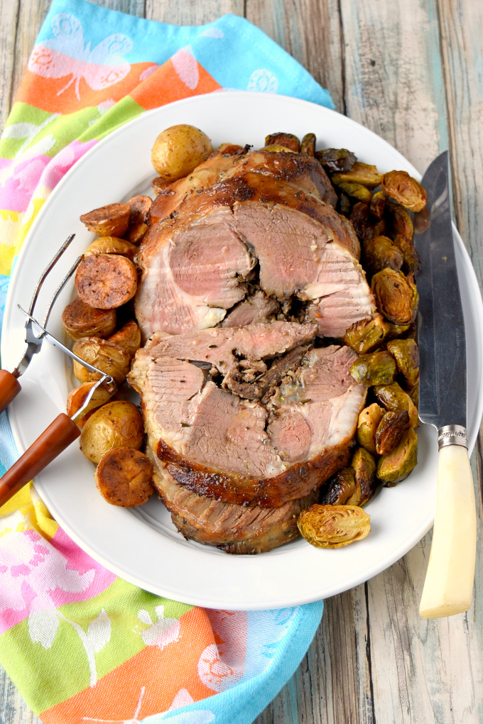 My first ever leg of lamb was ah-mazing!  Rosemary Garlic Roasted Leg of Lamb is simple to prepare and makes a stunning presentation at your Easter dinner with family and friends.  Don’t let lamb intimidate you like it did me.