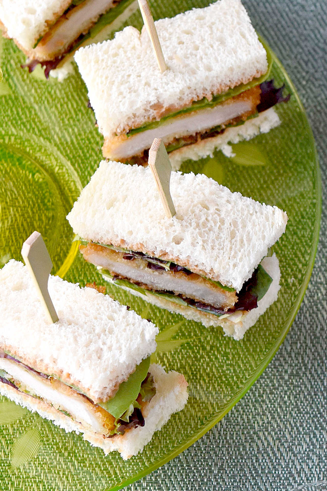 Meet your new brunch favorite: Katsu Sando Finger Sandwiches. Each bite brings crisp, juicy cutlet between pillowy bread, perfect for sharing with friends.  #OurFamilyTable #KatsuSandoHeaven #FingerSandwichFrenzy #SandosForDays #JapaneseSandwichSensation #SandoSquadGoals