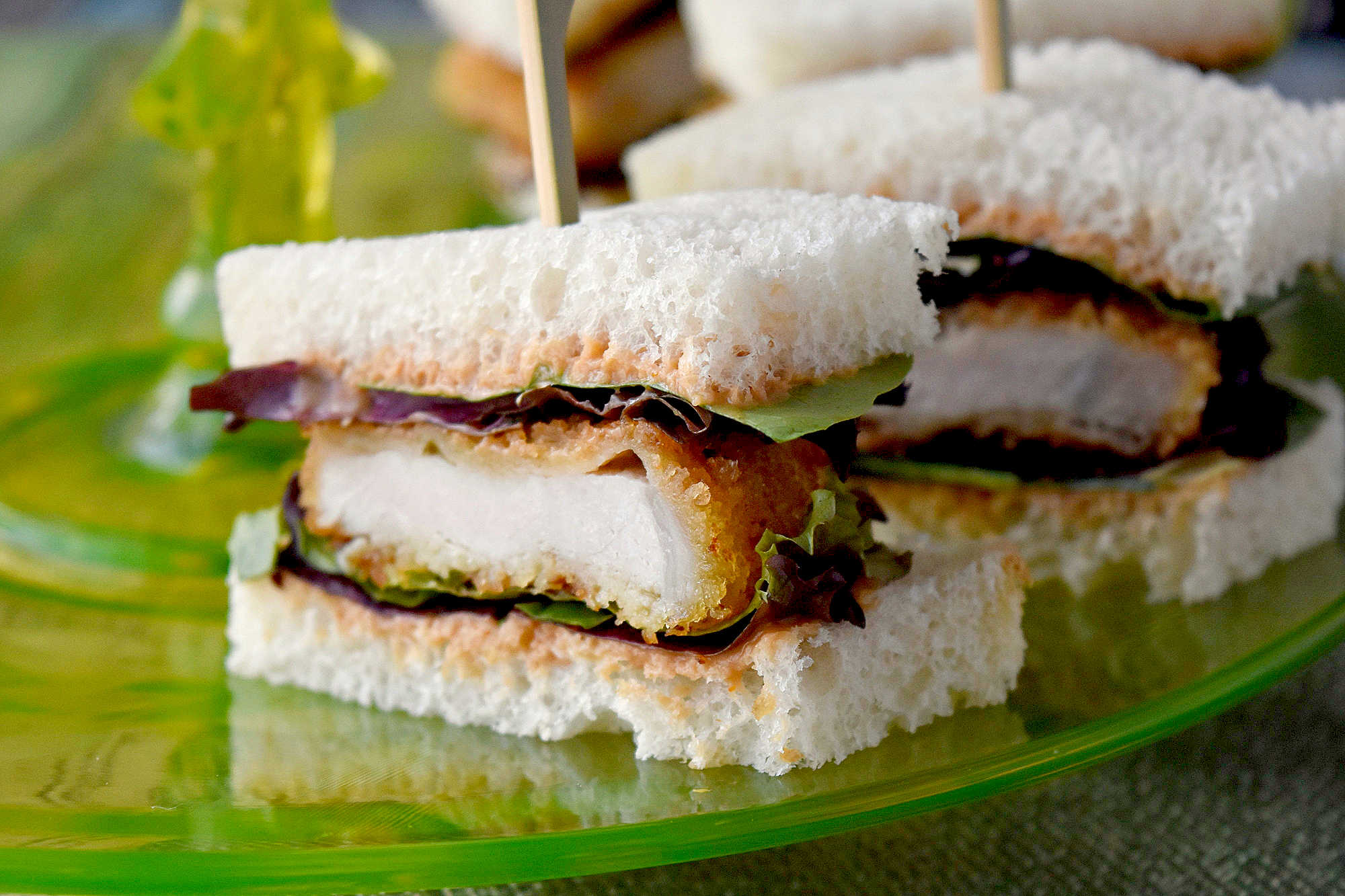 Meet your new brunch favorite: Katsu Sando Finger Sandwiches. Each bite brings crisp, juicy cutlet between pillowy bread, perfect for sharing with friends.  #OurFamilyTable #KatsuSandoHeaven #FingerSandwichFrenzy #SandosForDays #JapaneseSandwichSensation #SandoSquadGoals