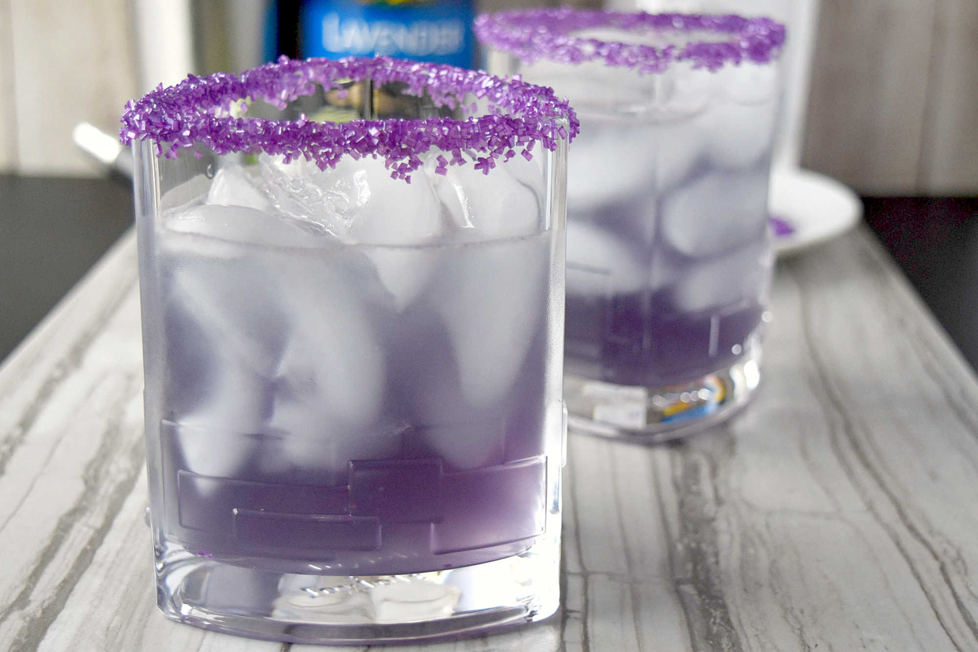 Have you ever tasted a Lightning Lavender Margarita? The balance of floral sweetness and zesty punch might become your new favorite. #BrunchWeek #JoyJolt #DrinkforJoy #Torani #SweetSquad #LightningLavenderMargarita #LavenderCocktails #CraftMargaritas #MixologyMagic #SummerSips