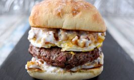 Corned Beef Hash Burger is just what you’re thinking.  Corned beef laced burger topped with crispy potatoes and a friend egg.  Not to mention the sautéed cabbage and stout mustard seed dijonnaise. #BurgerMonth