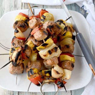 Grilled Italian Sausage Kabobs are like a sausage hoagie without the bun, the sauce, and the cheese.  Okay so it’s really not like a sausage hoagie, but they're super delicious anyway! #BBQWeek