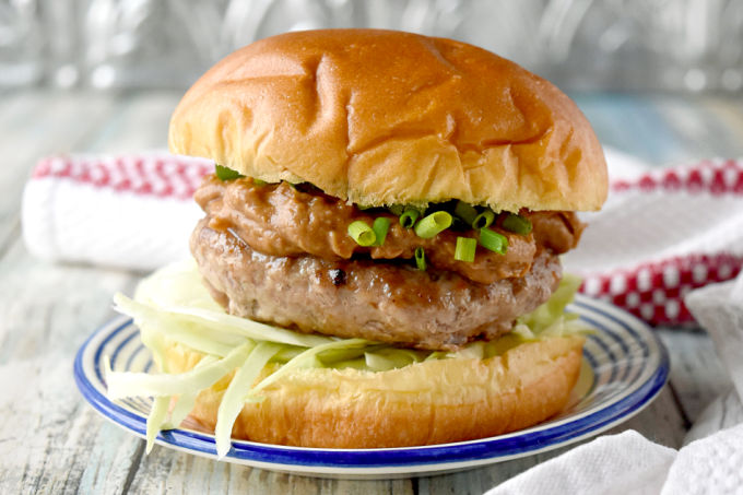 Satay Burger with Tamarind Fig Peanut Sauce has a juicy pork patty topped with a complex tamarind fig satay sauce that's irresistible!  The sweet tamarind and fig is paired with the salty soy and oyster sauces with a kick of ginger. #BurgerMonth #BurgerMonth2019