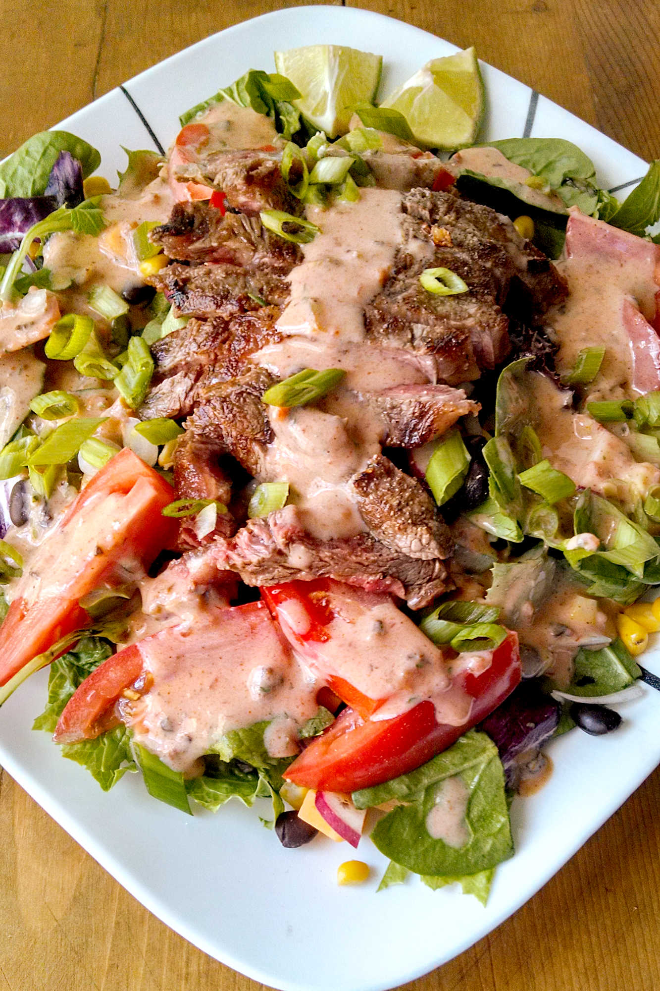 Treat yourself to a flavorful Tex-Mex Steak Salad drenched in our homemade Chipotle Ranch Dressing. Perfect for lunch or dinner, this dish is sure to hit the spot! #TexMexSteakSalad #SaladSzn #HealthyEating #FoodieFavs #CincoDeMayoEats  #ChipotleRanchDressing #HealthyEats #SaladInspiration #FoodieFaves