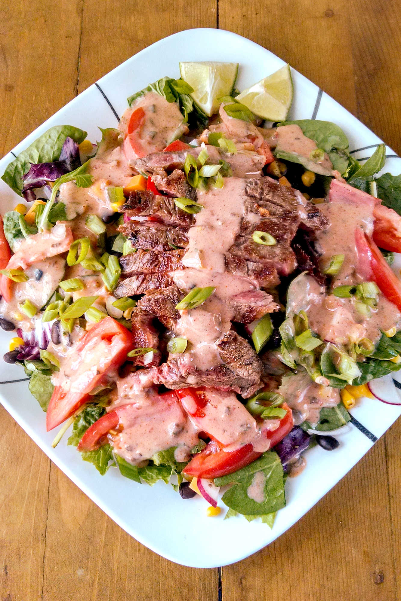 Treat yourself to a flavorful Tex-Mex Steak Salad drenched in our homemade Chipotle Ranch Dressing. Perfect for lunch or dinner, this dish is sure to hit the spot! #TexMexSteakSalad #SaladSzn #HealthyEating #FoodieFavs #CincoDeMayoEats  #ChipotleRanchDressing #HealthyEats #SaladInspiration #FoodieFaves