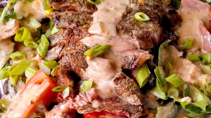 Treat yourself to a flavorful Tex-Mex Steak Salad drenched in our homemade Chipotle Ranch Dressing. Perfect for lunch or dinner, this dish is sure to hit the spot! #TexMexSteakSalad #SaladSzn #HealthyEating #FoodieFavs #CincoDeMayoEats #ChipotleRanchDressing #HealthyEats #SaladInspiration #FoodieFaves