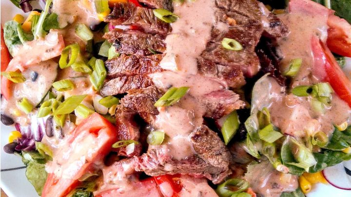 Treat yourself to a flavorful Tex-Mex Steak Salad drenched in our homemade Chipotle Ranch Dressing. Perfect for lunch or dinner, this dish is sure to hit the spot! #TexMexSteakSalad #SaladSzn #HealthyEating #FoodieFavs #CincoDeMayoEats #ChipotleRanchDressing #HealthyEats #SaladInspiration #FoodieFaves
