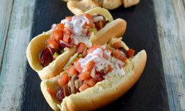 Air Fryer Bacon Wrapped Hot Dogs are simple to make and elevated with pico de gallo and crema toppings. The smoky and salty bacon complements the crisp and cool pico and rich crema. #OurFamilyTable