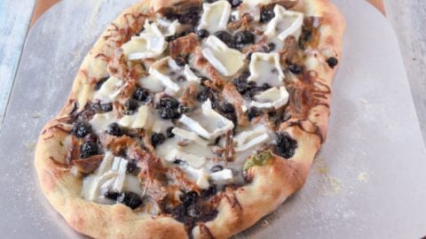 Blueberry Brie Duck Flatbread has ALL the flavors! From rich roast duck to sweet blueberries and creamy brie, it's an appetizer or light dinner your family will DEVOUR! #BlueberryWeek