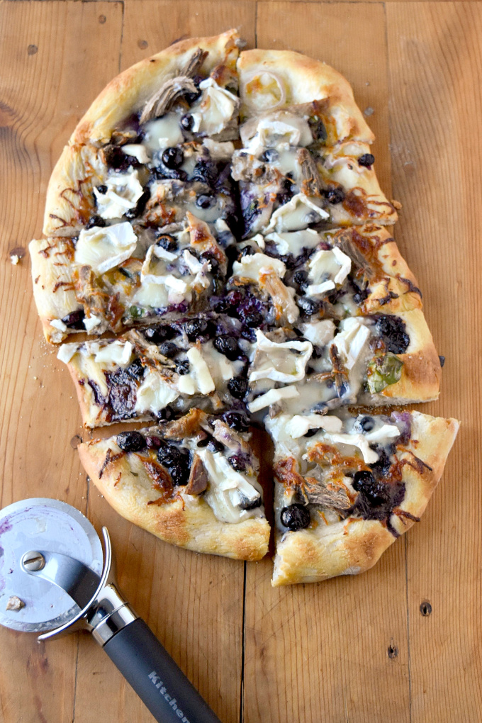 Blueberry Brie Duck Flatbread has ALL the flavors! From rich roast duck to sweet blueberries and creamy brie, it's an appetizer or light dinner your family will DEVOUR! #BlueberryWeek
