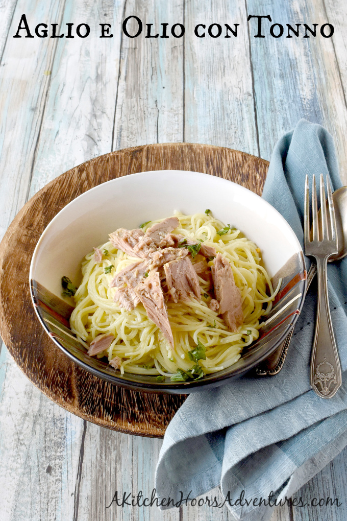 Aglio e Olio with Tuna might sound simple, but it's anything but!  The complex flavors of the tuna with the olive oil and garlic makes for quick and easy meal that taste amazing.  #temptingyourtaste #tonninobloggerchallenge 
