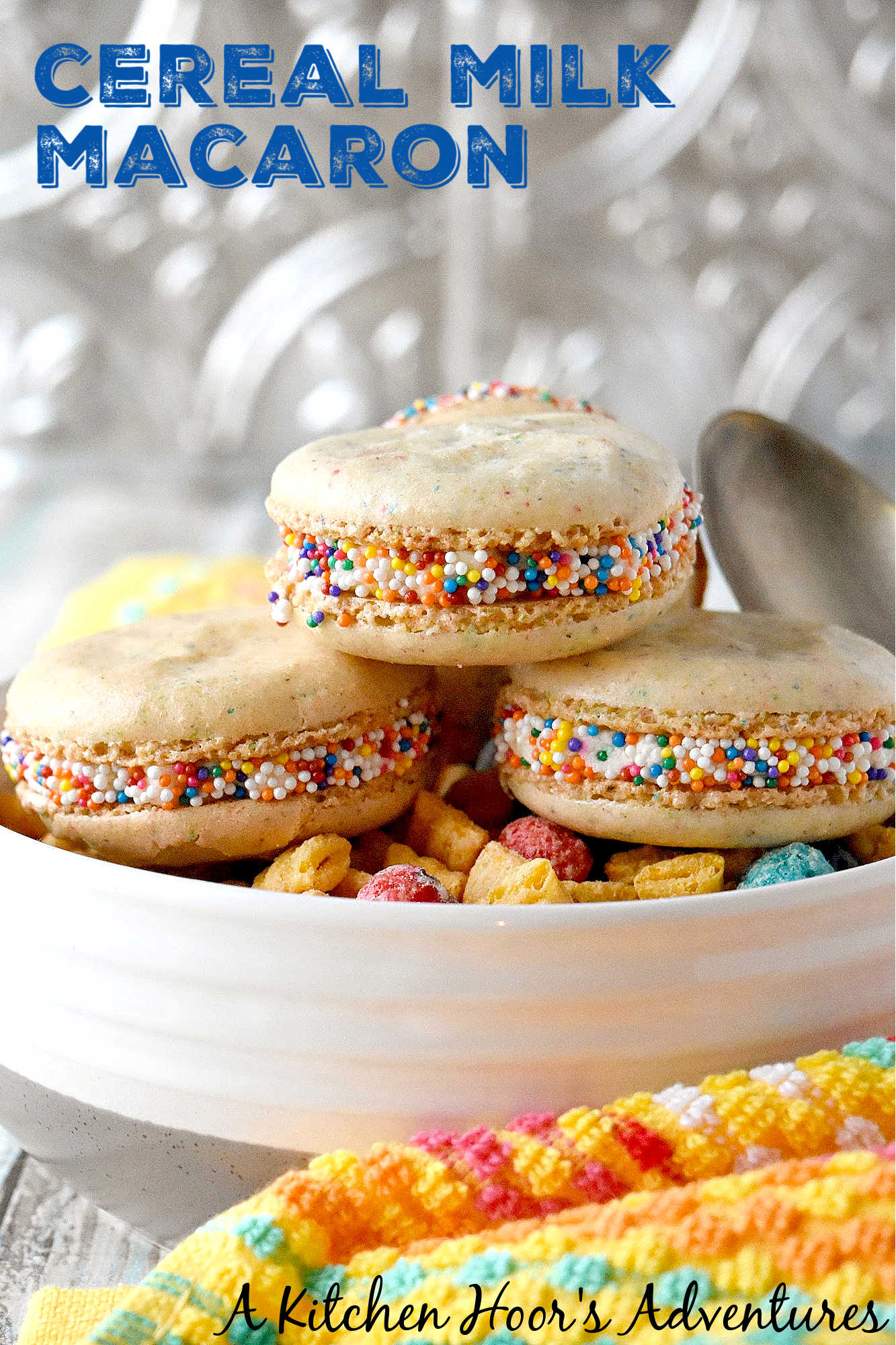 Cereal Milk Macaron taste like your favorite fruit cereal.  There's cereal in the shells and cereal milk in the buttercream.   #BacktoSchoolTreats
