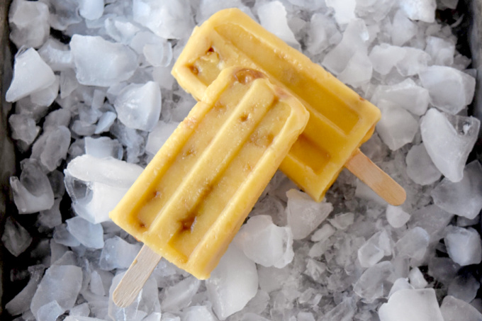 Mango Macadamia Nut Popsicles have sweet mango, creamy yogurt, mango juice, and exotic macadamia nuts. They whip up in no time and taste oh so delicious. #Stonefruit