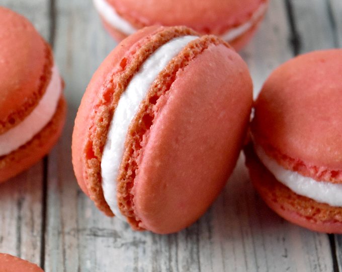 There's a double whammy of peach flavor in these Peach Macaron.  They have freeze dried peaches in the shells and peach syrup in the buttercream.  A bi-fecta of peach flavors. #Stonefruit