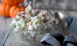 This Ectoplasm Fluff Salad isn't slimy it at all!  In fact, it's packed with delicious pistachio pudding, pineapple, and marshmallows for a fun and delicious Halloween treat. #HalloweenTreatsWeek