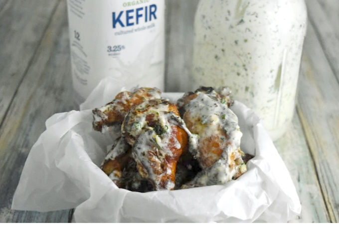 Kefir Marinated Air-Fryer Wings are marinated in a kefir and Buffalo sauce mixture which makes them tender with a delicious crispy caramelized skin. The homemade kefir ranch dressing takes it all over the top for a flavor explosion! #lifewaykefir #madewithlifeway #loveyourguts #lifewayrecipechallenge