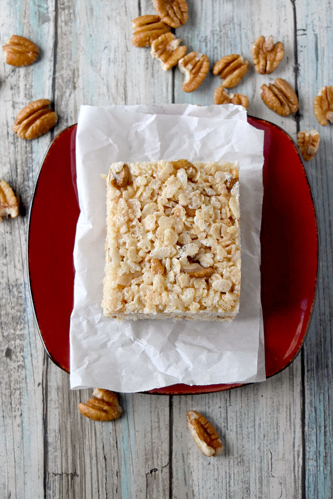 Maple Butter Pecan Rice Krispie Treats are the be all end of all of rice krispie treats.  They have so much fall flavor in them, you can almost smell the leaves in the air. #FallFlavors