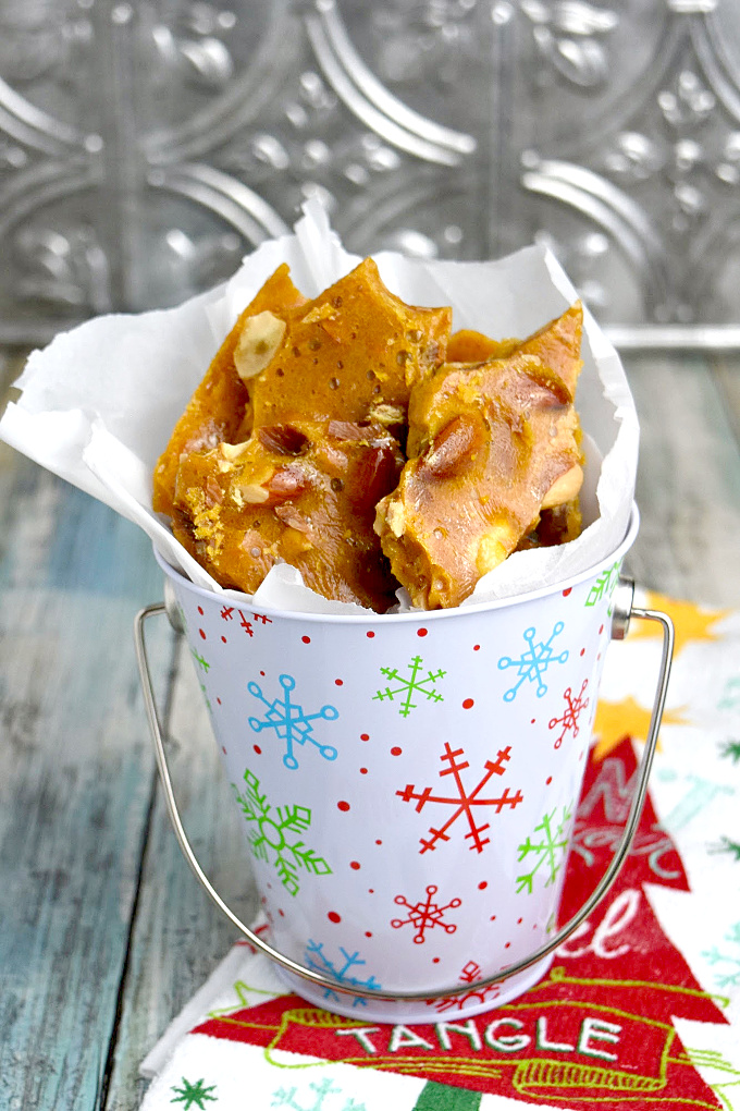 With just a handful of ingredients and a few minutes in the microwave, this Easy Nut Brittle is a last minute time saver for surprise guests or gifts. #ChristmasSweetsWeek