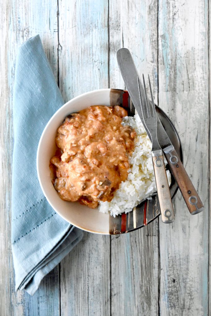Slow Cooker Tuscan Garlic Chicken is creamy, full of garlic and tomato flavors, and perfect for any night of the week. It’s a recipe that’s on our menu at least once a month.