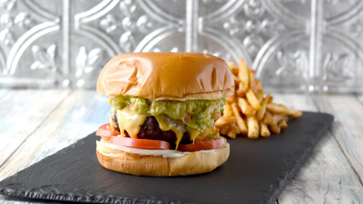 Upgrade your next BBQ with this flavorful Sink Your Teeth Into a Carne Asada Burger with Chipotle Guacamole. Say goodbye to bland patties and hello to juicy and flavorful!