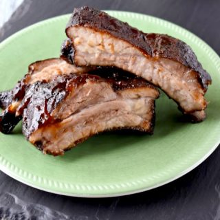 Smoked Ribs with KC Sauce are so simple to make but lip smackingly delicious! The KC sauce is simply dressed up bottled sauce with a different taste to your ribs. #BBQWeek