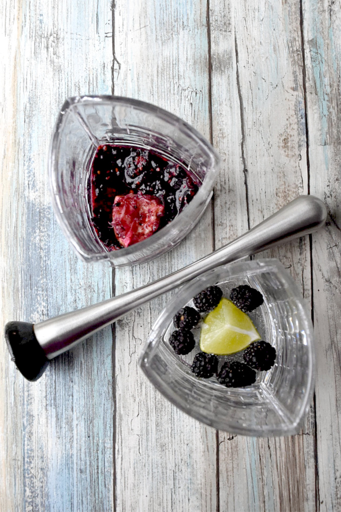 Blackberries and limes are muddle together then topped with craft bourbon and ginger beer in this Blackberry Bourbon Mule.  The tart lime and tasty berries compliment the smoky rich flavor of the bourbon. #BerryWeek