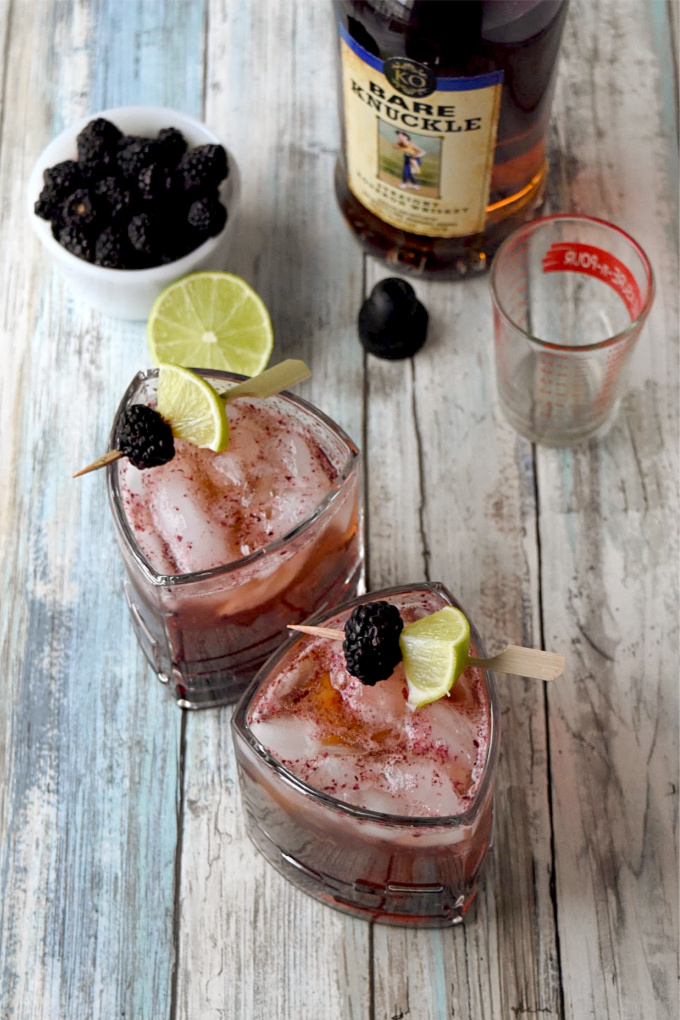 Blackberries and limes are muddle together then topped with craft bourbon and ginger beer in this Blackberry Bourbon Mule.  The tart lime and tasty berries compliment the smoky rich flavor of the bourbon. #BerryWeek