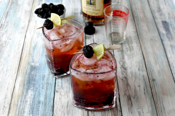 Blackberries and limes are muddle together then topped with craft bourbon and ginger beer in this Blackberry Bourbon Mule.  The tart lime and tasty berries compliment the smoky rich flavor of the bourbon. #BerryWeek