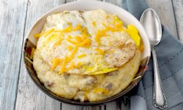 Sausage Egg and Cheese Grits turns this southern breakfast staple into a whole meal on it's own. This could easily turn into a grits bar with cheese and eat choices for your guests.