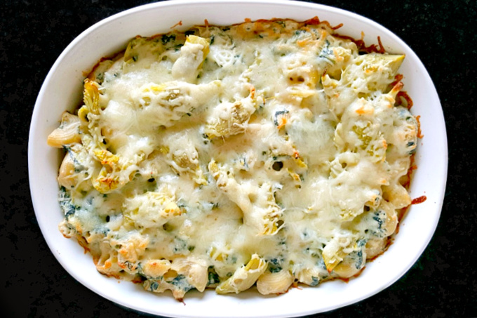 Adding spinach and artichokes to regular macaroni and cheese makes this Spinach and Artichoke Mac and Cheese hearty enough even for the most die hard meat eaters.  