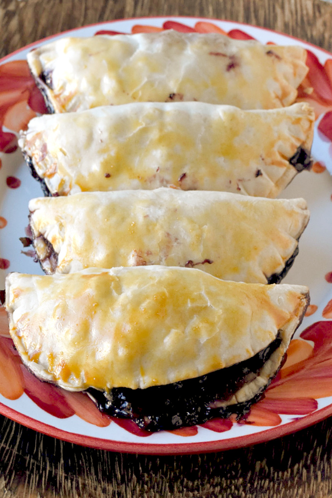 With only six ingredients, Blueberry Hand Pies are simple and simply delicious!  With a hint of ginger, these hand pies are packed with flavor. #SummerDessertWeek