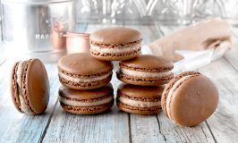 Brownie Batter Macaron have cocoa powder in the shells and brownie batter in the buttercream filling.  They're rich, chocolate, and oh so delicious. #SummerDessertWeek