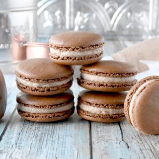 Brownie Batter Macaron have cocoa powder in the shells and brownie batter in the buttercream filling.  They're rich, chocolate, and oh so delicious. #SummerDessertWeek