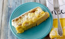 Tropical Icebox Cake has mango and pineapple buried in the custard and mousse style filling between the graham cracker layers.  It's simple and simply delicious. #SummerDessertWeek
