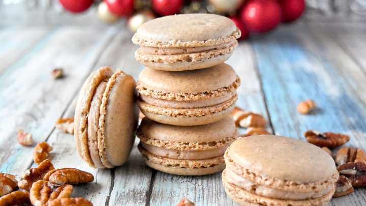 Cinnamon Pecan Macaron have the flavor of those fair cinnamon pecans in a macaron cookie. They’re packed with pecan and cinnamon flavors with a hint of caramel in the filling. #ChristmasCookies