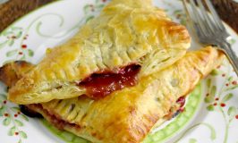 Cranberry Orange Turnovers are slightly sweet, slightly tart, and totally delicious!  Made with puff pastry, they whip up in no time for a delicious dessert on the quick. #CranberryWeek