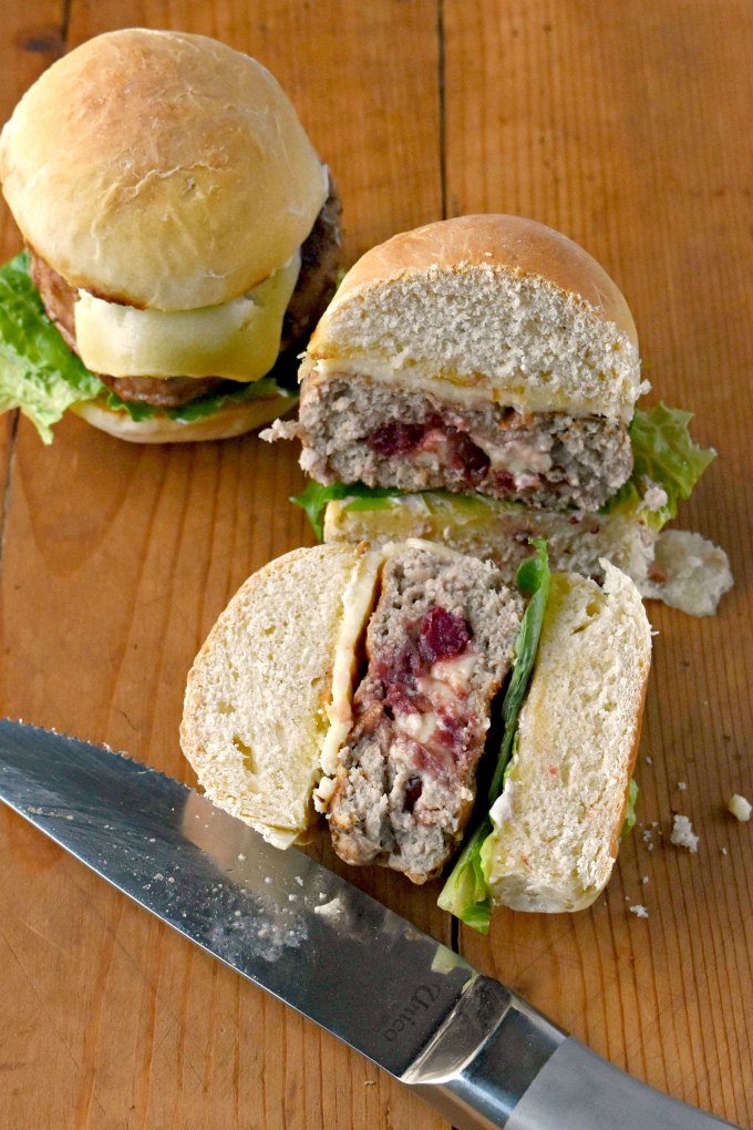 Leftover cranberry sauce and cheese from your charcuterie board combines to make Juicy Lucy Thanksgiving Sliders!  A fun and delicious lunch for the family.
