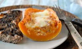 Twice Baked Butternut Squash is a twist on the twice baked potato. The sweet squash is combined with prosciutto, goat cheese, and shallots then topped with Gruyere cheese for a truly scrumptious side dish. #HolidaySideDishes