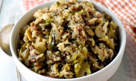 Wild Rice and Sprouts Pilaf is the perfect side dish to any holiday meal. Any meal for that matter. With long grain and wild rice simmered with Brussels sprouts and thick cut bacon, it’s a side dish you’re family will love! #HolidaySideDishes