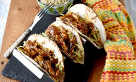 Chicken Tikki Masala Tacos taste amazing for a meal made in under 30 minutes. The chicken simmers in delicious tikki masala sauce and the slaw has extra crunch from the broccoli and peanuts. #eatcleanlivehappy #kevinsnaturalfoods #kevinsrecipechallenge