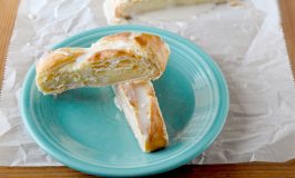 Eggnog Cream Cheese Danish comes together in no time and feeds the hungry masses until the presents are opened.  With a hint of eggnog in the filling and eggnog glaze on top, it’s the holidays wrapped in puff pastry. #ChristmasSweetsWeek