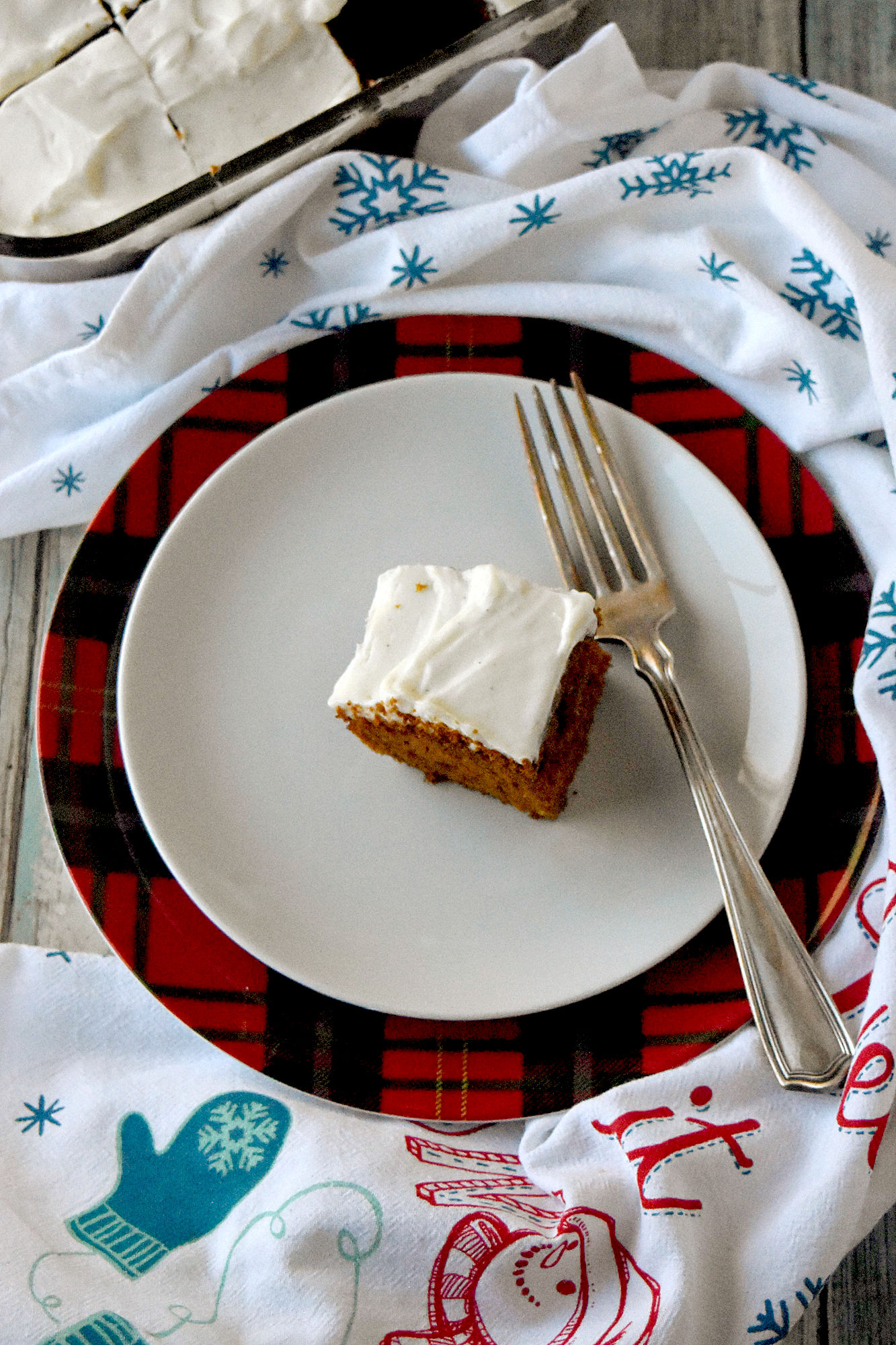 Gingerbread Snack Cake is bite sized but is not small on flavor.  There’s fresh ginger, ground ginger, cinnamon, and nutmeg in this delicious, bite-sized snack cake. #ChristmasSweetsWeek