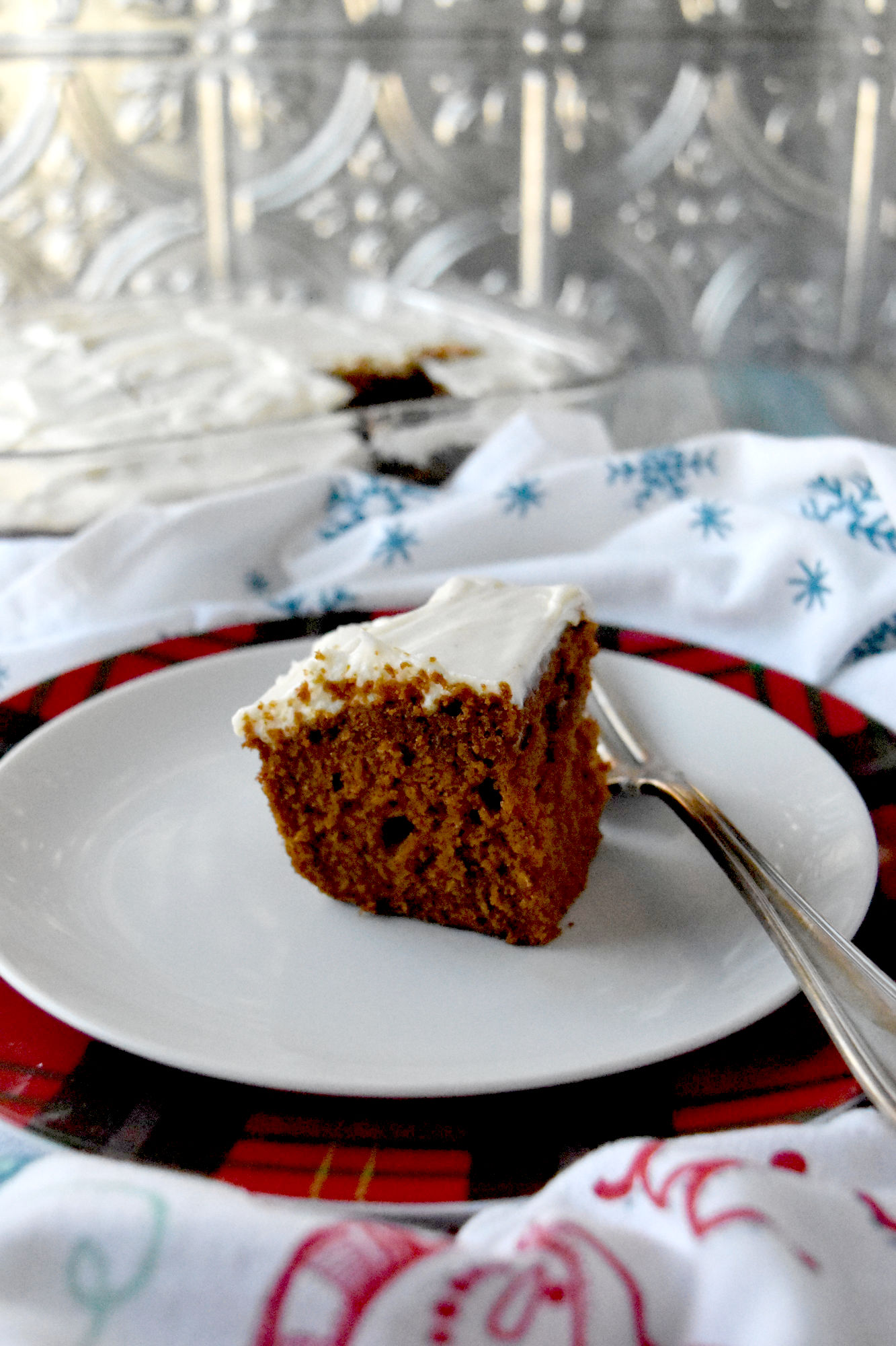 Gingerbread Snack Cake is bite sized but is not small on flavor.  There’s fresh ginger, ground ginger, cinnamon, and nutmeg in this delicious, bite-sized snack cake. #ChristmasSweetsWeek