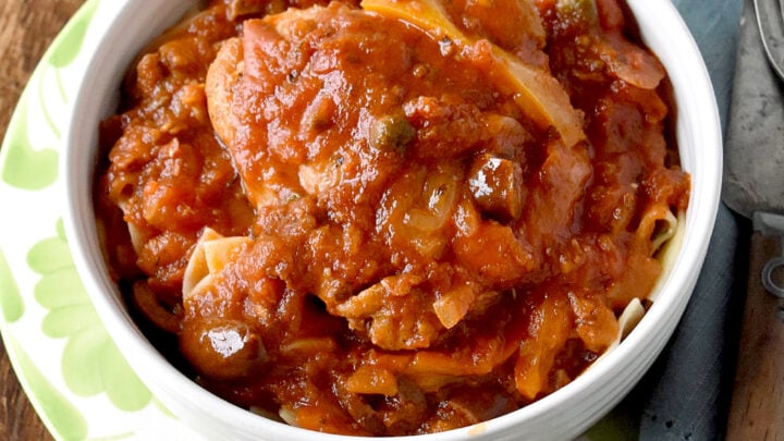 Easy Slow Cooker Cacciatore is hearty, rich, and perfect for cold nights! It has complex flavors from simple ingredients. #NationalSlowCookerMonth #cacciatore #chickenrecipe #slowcooker