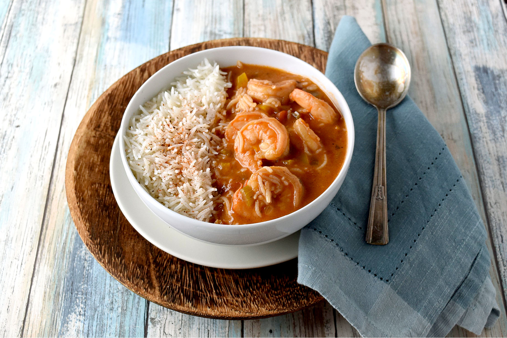 Shrimp Étouffée takes just a little effort but is will worth it!  The reward shrimp is a smooth and creamy broth and that thick and rich. #OurFamilyTable