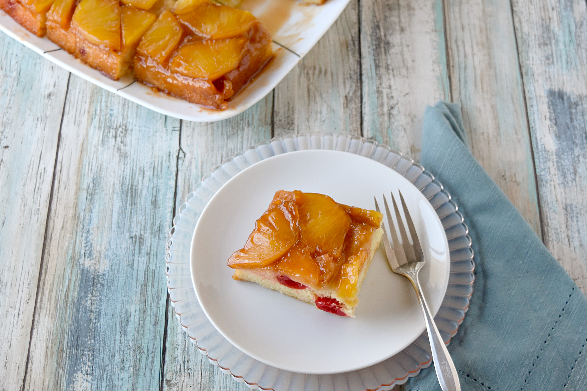 Fresh Pineapple Upside Down Cake has fresh, sweet t on top hand light and moist cake underneath.  It's a simple and quick cake that bakes up easily. #SpringSweetsWeek