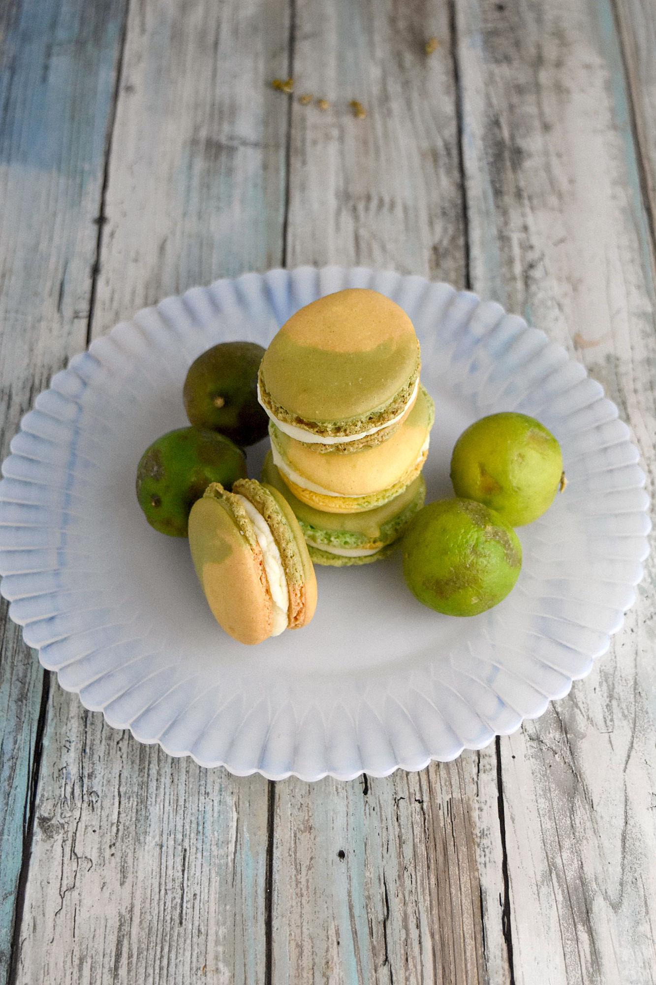 Lemon Lime Macaron have lemon in the shells and key lime buttercream filling.  They're the perfect sweet tart treat.