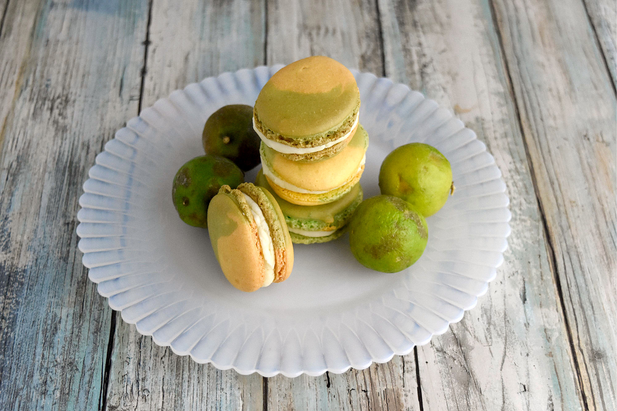 Lemon Lime Macaron have lemon in the shells and key lime buttercream filling.  They're the perfect sweet tart treat.