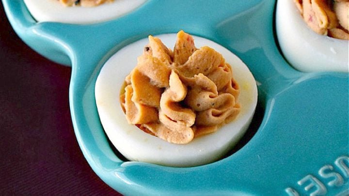 Spice up your feed (and your party menu!) with this flavorful twist on a classic: Middle Eastern Deviled Eggs! Made with 2 kinds of creamy hummus and roasted red peppers, then added a punch of za'atar and sumac for a zesty, savory kick that’s seriously addictive. #deviledeggs #hummus #Easter #MiddleEasternEats #DeviledEggPerfection #SavorySnacks #EggcellentRecipes #FlavorsofTheLevant