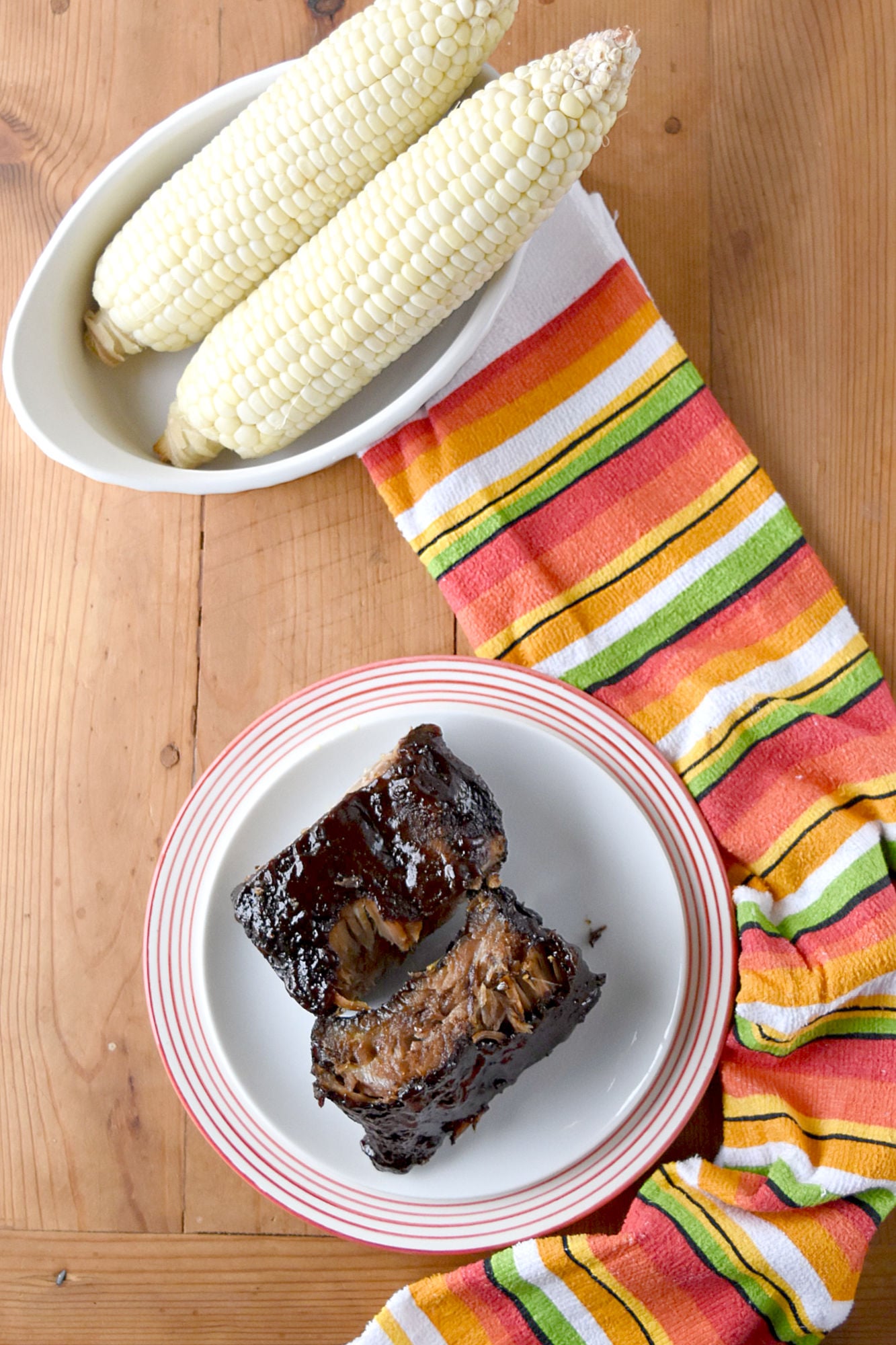 Easy Smoked Ribs are tender, delicious, and mostly hands off. Even if you don't have a smoker you can still have delicious ribs for your barbecue. #BBQWeek
